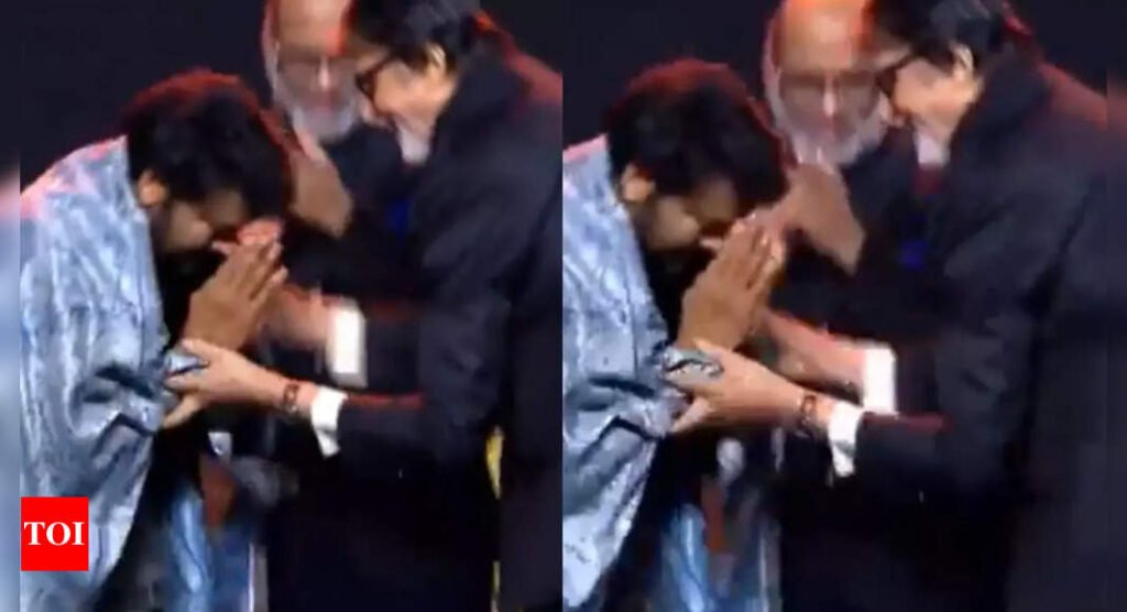 Chiranjeevi touches Amitabh Bachchan's feet with respect at a recent award ceremony hosted by Nagarjuna Akkineni's family