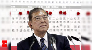Japan's governing coalition loses majority, poll outcome in balance
