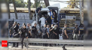 One dead, 40 injured as truck rams a bus stop near Mossad HQ in Tel Aviv