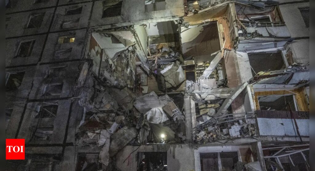 Russian bomb hits residential building in Ukraine's 2nd largest city, killing 12-year-old boy