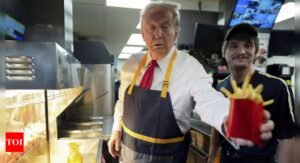 'Worked 15 minutes more than Kamala ... ' Trump visits McDonald's in Philadelphia; works the frier