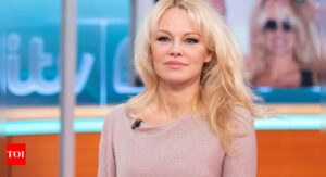 Pamela Anderson embraces natural beauty in a chic gray outfit during her L.A. appearance | English Movie News