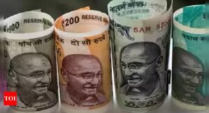 Rupee gains six paise against dollar to close at 84.44